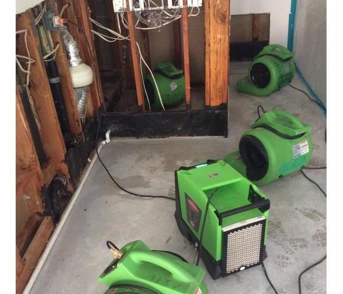 Equipment set up to treat water damage.