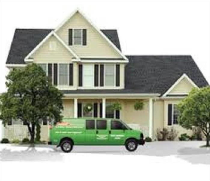 SERVPRO van parked in front of a home
