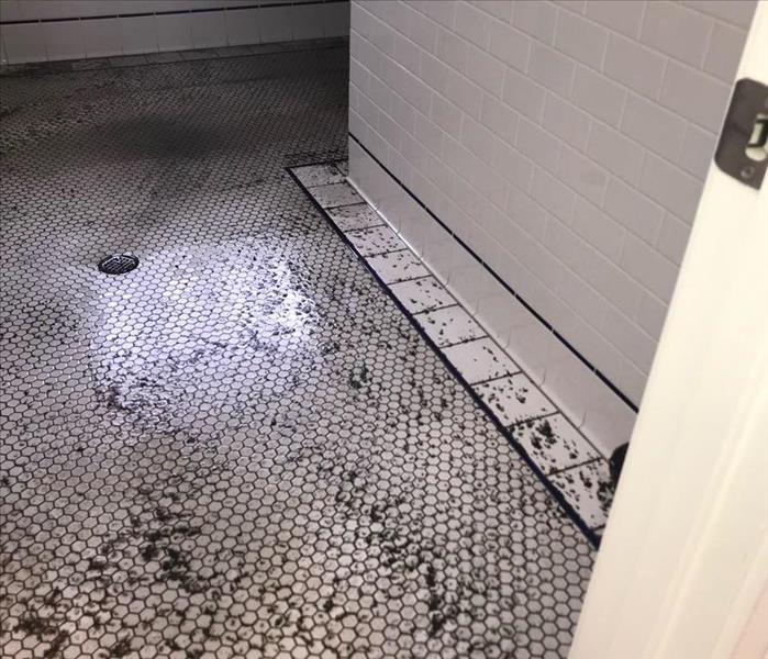 Sewage on a bathroom floor at a church